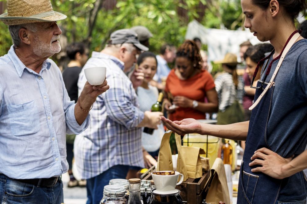 people enjoying a food fair